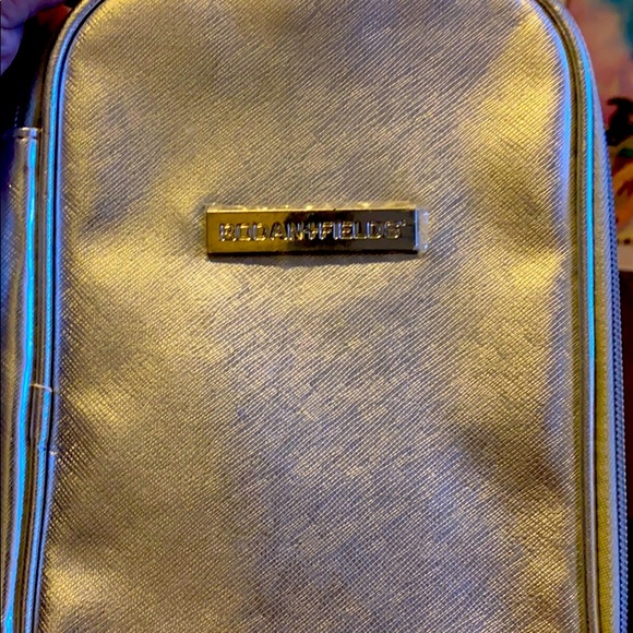 Rodan + Fields Handbags - Rodan and Fields Silver Makeup Purse New